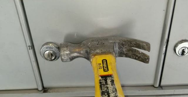 A hammer on a keyhole