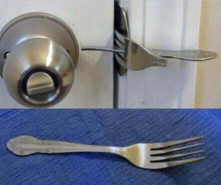 Using a fork to open a door knob