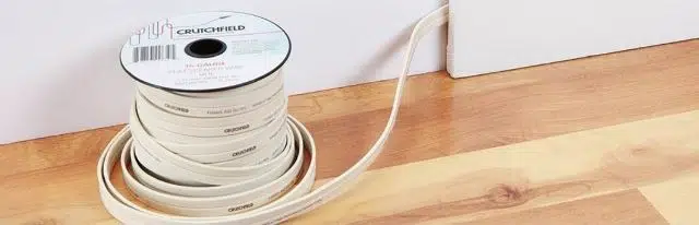 Hide Speaker Wires on  hardwood floor