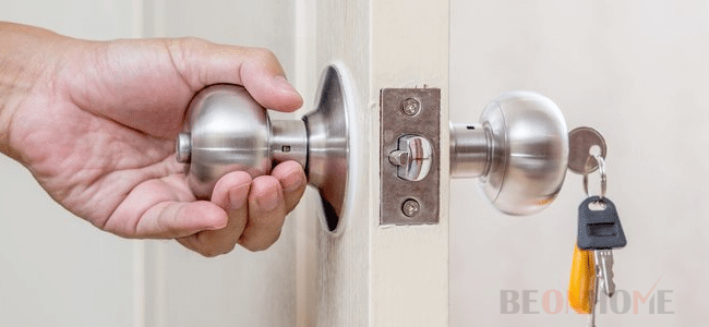 A jammed door knob with keys inserted