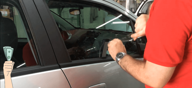 A Person Unlocking A Car Door