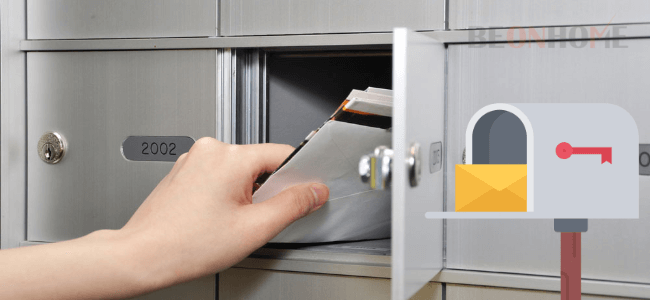 A person taking out some mails from a locker