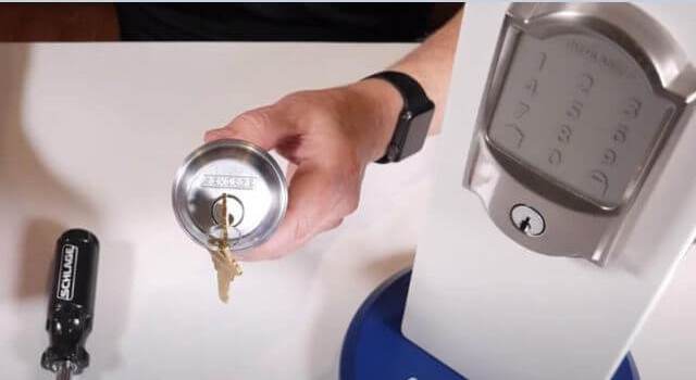 A person Rekeying Schlage Lock Without Original Key