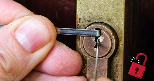 A person Unlocking a Deadbolt Lock