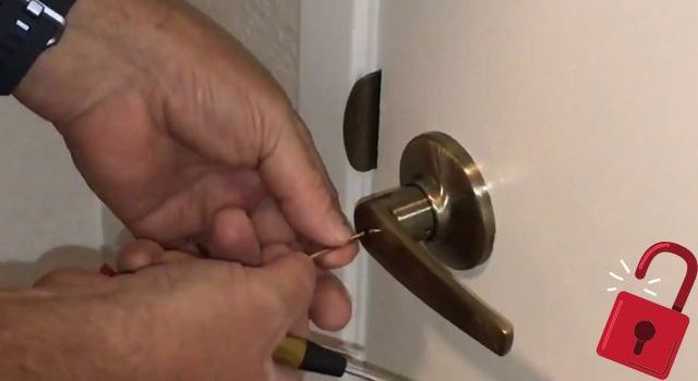 A person Unlocking a Lever Lock
